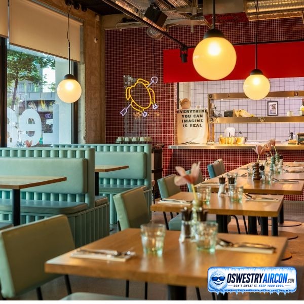 Restaurant interior with a visible air conditioning system helping regulate temperature and ensure a pleasant atmosphere for diners. &ndash; Oswestry