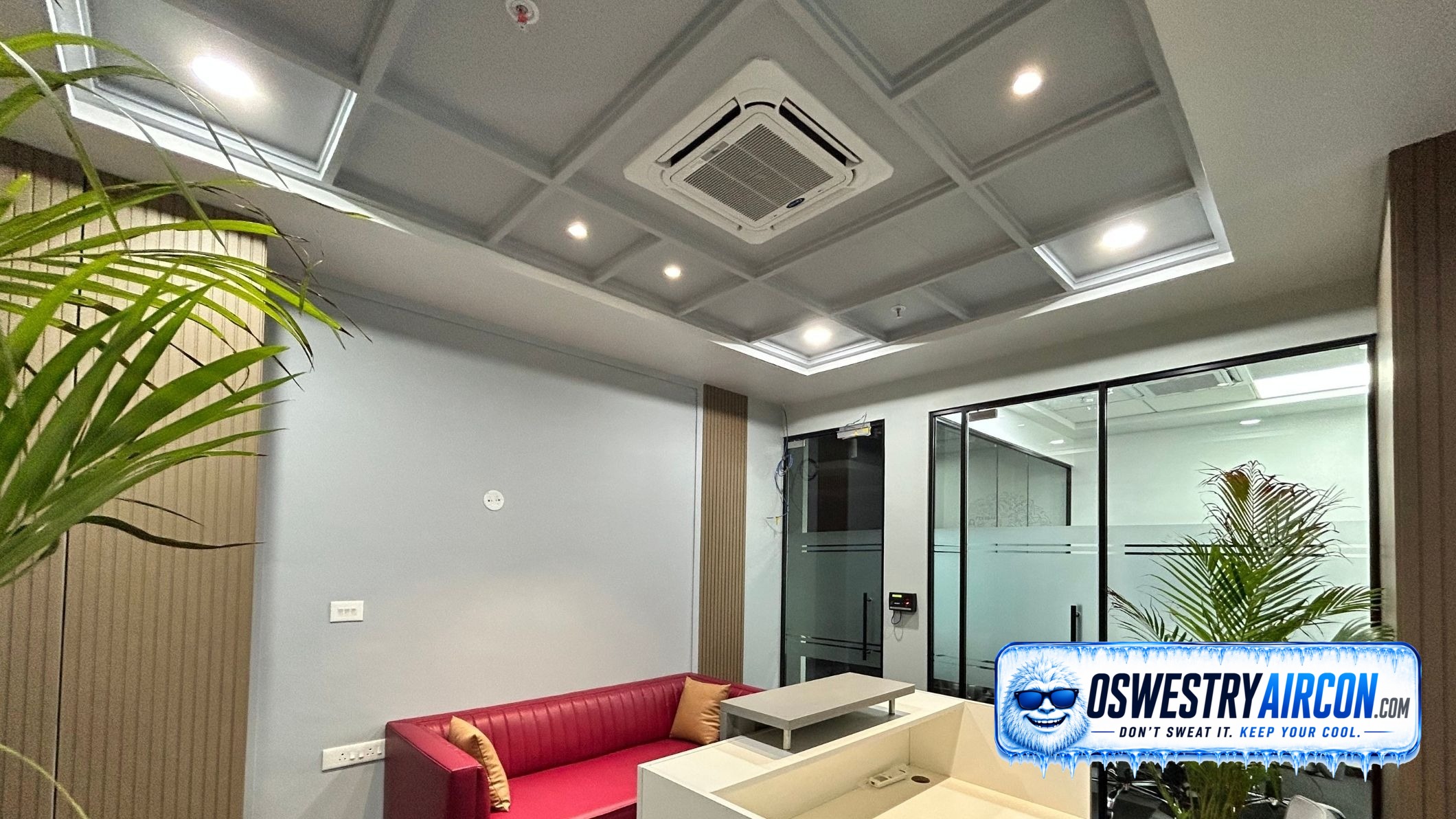 Ceiling cassette air conditioner installed in an office lobby, providing even cooling and maintaining a comfortable temperature for visitors. &ndash; Oswestry