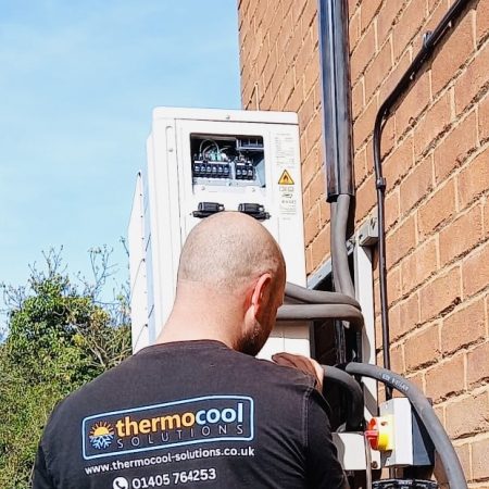 Oswestry Air Conditioning engineer checking