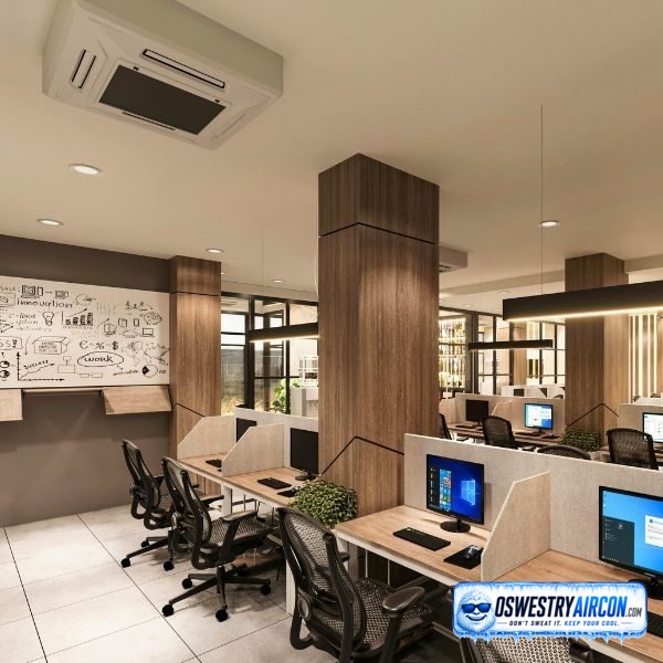 Ceiling-mounted air conditioning unit installed in an office, providing efficient cooling and maintaining a comfortable indoor working environment. &ndash; Oswestry